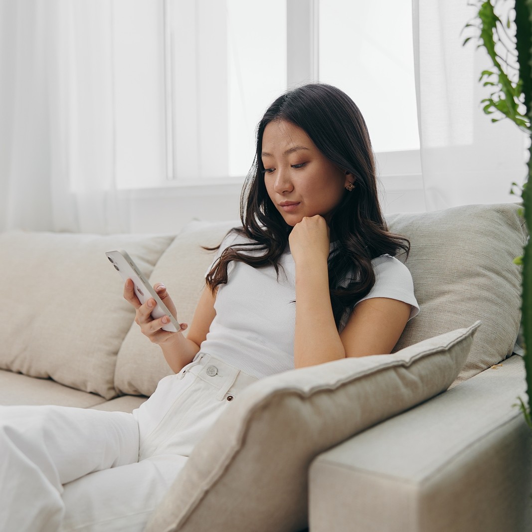 A Tennessee woman searching on her phone "How Does the Abortion Pill Reversal Work?"