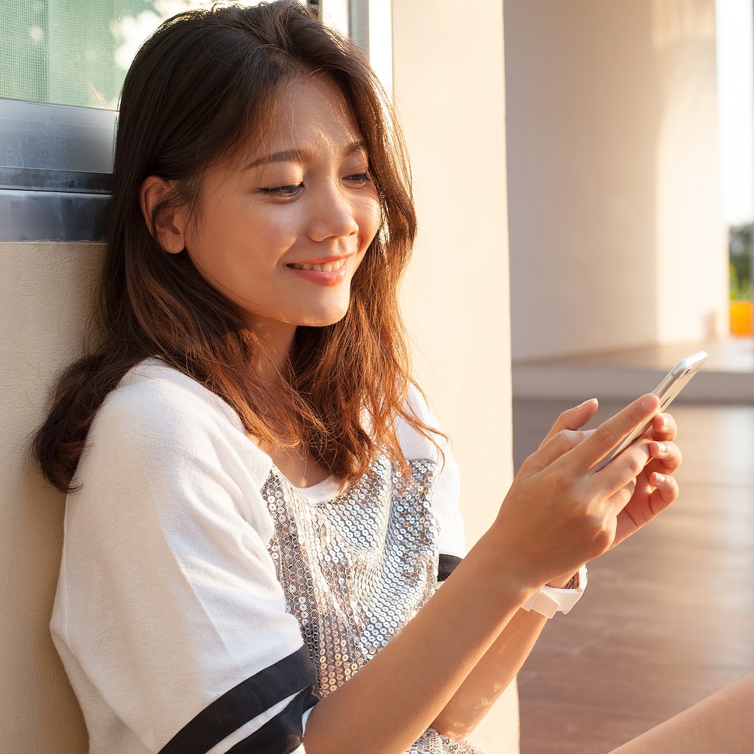 A woman searching on her phone "What If You Have Taken Mifepristone and Misoprostol?"